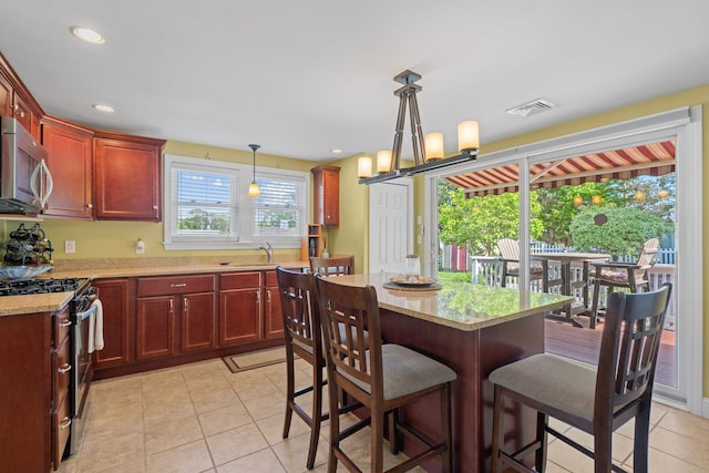 44 Buttermilk Way, Buzzards Bay, MA 02532 - dining area with light tile patterned floors and recessed lighting