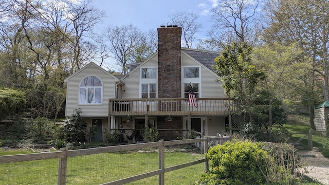 532 S Orleans Rd, Orleans, MA 02653 - back of property with a deck and a chimney