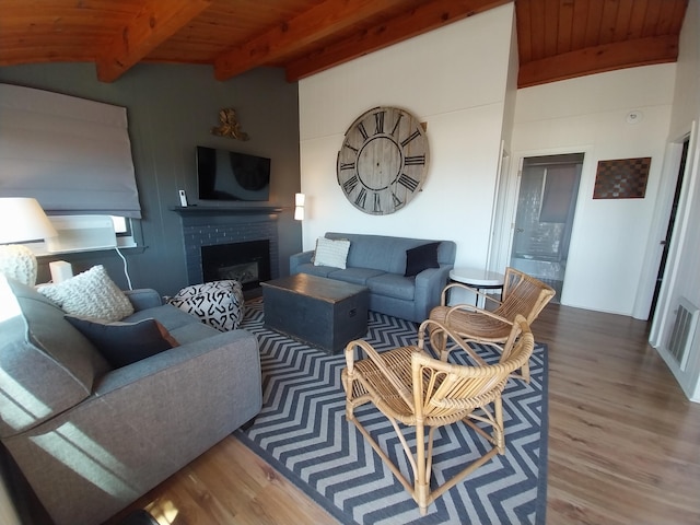 100 Hiawatha Rd Unit B, Wellfleet, MA 02667 - living area featuring wood finished floors, wood ceiling, and a fireplace