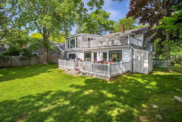 117 Parker Rd, Osterville, MA 02655 - rear view of property with a balcony, a chimney, and a deck
