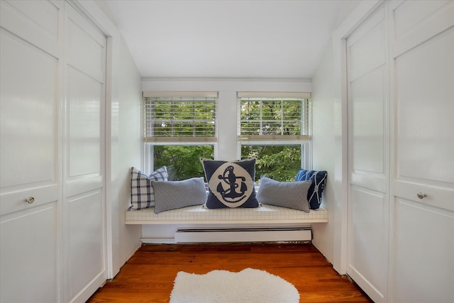 117 Parker Rd, Osterville, MA 02655 - living area featuring baseboard heating, wood finished floors, and lofted ceiling