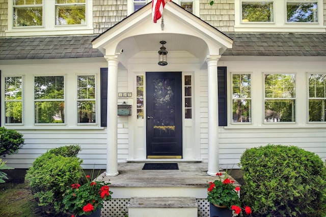 117 Parker Rd, Osterville, MA 02655 - property entrance with a shingled roof