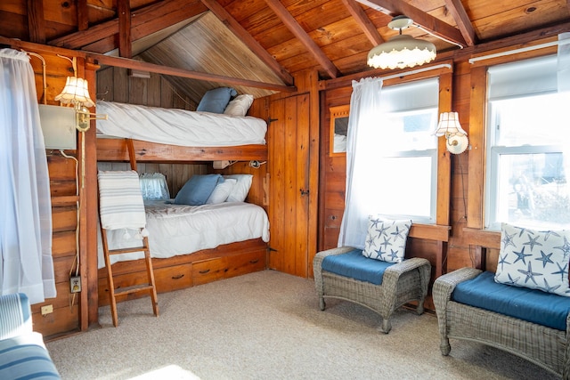 bedroom featuring wooden walls, wooden ceiling, and lofted ceiling with beams