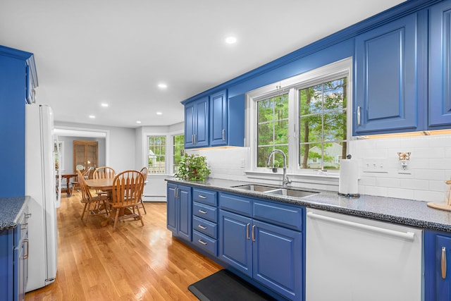 12 Copley Pl, South Yarmouth, MA 02664 - kitchen with white appliances, light wood-style floors, decorative backsplash, recessed lighting, and blue cabinets