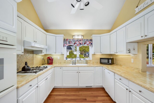 240 Surf Dr, Mashpee, MA 02649 - kitchen featuring white appliances, a sink, lofted ceiling, under cabinet range hood, and ceiling fan