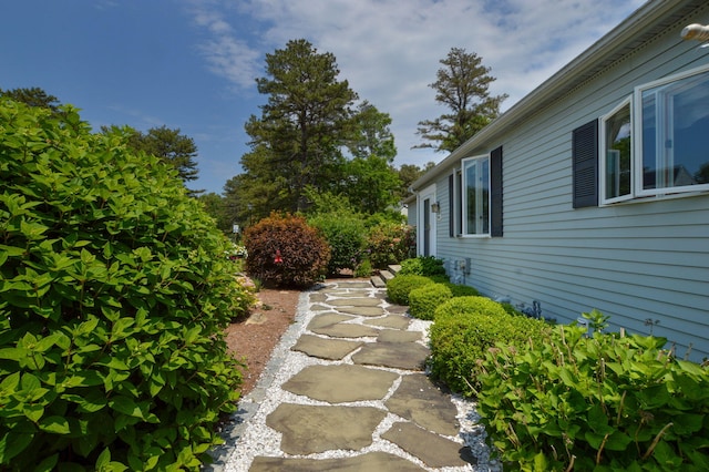240 Surf Dr, Mashpee, MA 02649 - view of exterior entry with a shingled roof