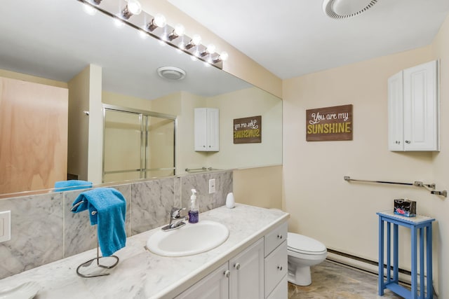 240 Surf Dr, Mashpee, MA 02649 - bathroom featuring backsplash, a shower stall, vanity, toilet, and a baseboard radiator
