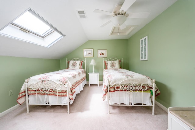 151 Leisure Green Dr N, Mashpee, MA 02649 - carpeted bedroom featuring lofted ceiling, a ceiling fan, and a skylight