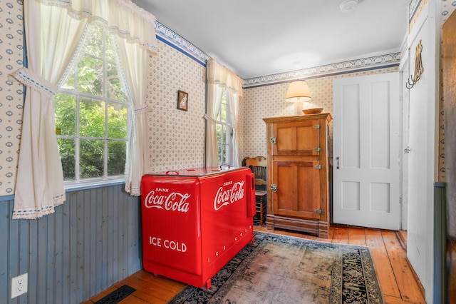 64 Riverside Dr, West Harwich, MA 02671 - entryway featuring wood-type flooring and wallpapered walls