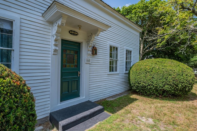 64 Riverside Dr, West Harwich, MA 02671 - entrance to property with a yard