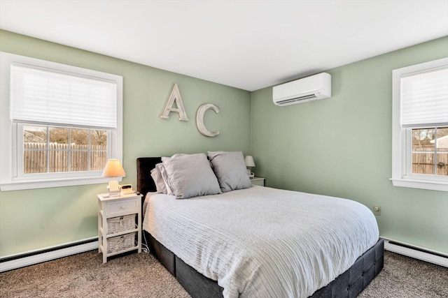 carpeted bedroom featuring a wall mounted air conditioner and a baseboard radiator