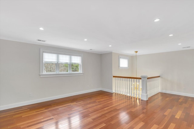 24 Pleasant Park Dr, Mashpee, MA 02649 - spare room featuring wood finished floors, recessed lighting, and ornamental molding