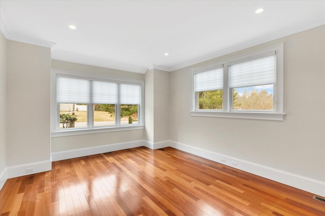 24 Pleasant Park Dr, Mashpee, MA 02649 - spare room with light wood-style flooring, ornamental molding, and recessed lighting