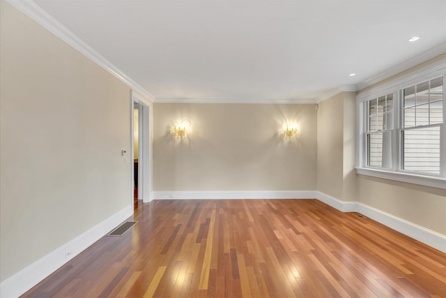 24 Pleasant Park Dr, Mashpee, MA 02649 - empty room with hardwood / wood-style floors and crown molding