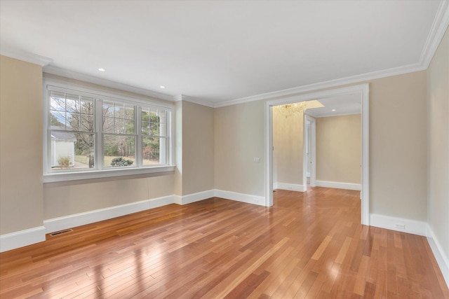 24 Pleasant Park Dr, Mashpee, MA 02649 - unfurnished room with crown molding and light wood finished floors