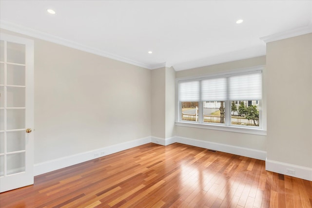 24 Pleasant Park Dr, Mashpee, MA 02649 - unfurnished room with crown molding, hardwood / wood-style flooring, and recessed lighting