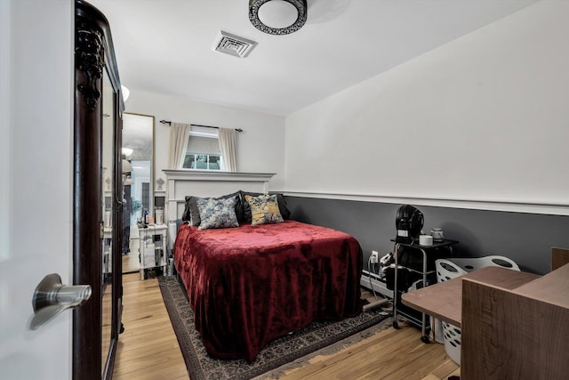 bedroom featuring light hardwood / wood-style flooring