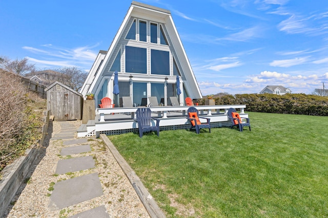 133 Breakwater Shores Dr, Hyannis, MA 02601 - rear view of house featuring a lawn