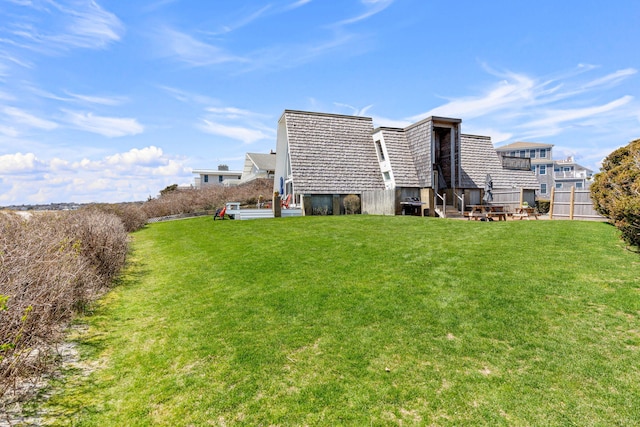 133 Breakwater Shores Dr, Hyannis, MA 02601 - rear view of property featuring a yard and fence
