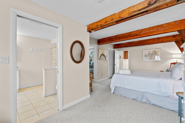 133 Breakwater Shores Dr, Hyannis, MA 02601 - tiled bedroom with carpet, beam ceiling, and baseboards
