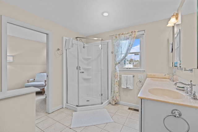 133 Breakwater Shores Dr, Hyannis, MA 02601 - full bath featuring baseboards, a sink, visible vents, and a stall shower