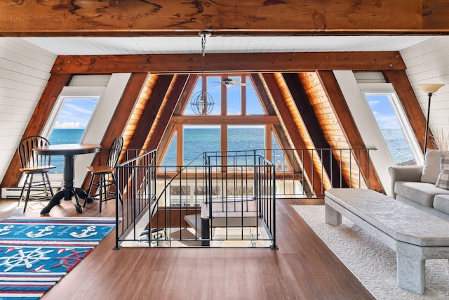 133 Breakwater Shores Dr, Hyannis, MA 02601 - interior space featuring wood finished floors, a water view, wood walls, and a healthy amount of sunlight