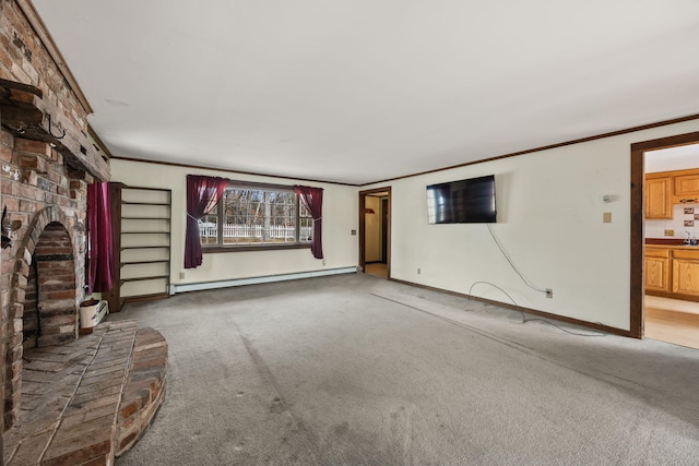 unfurnished living room with carpet flooring, crown molding, baseboards, and a baseboard radiator