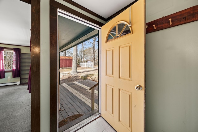 interior space with carpet flooring and crown molding