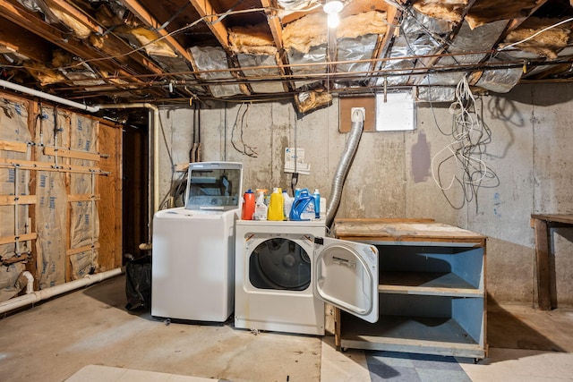 laundry area with laundry area and separate washer and dryer