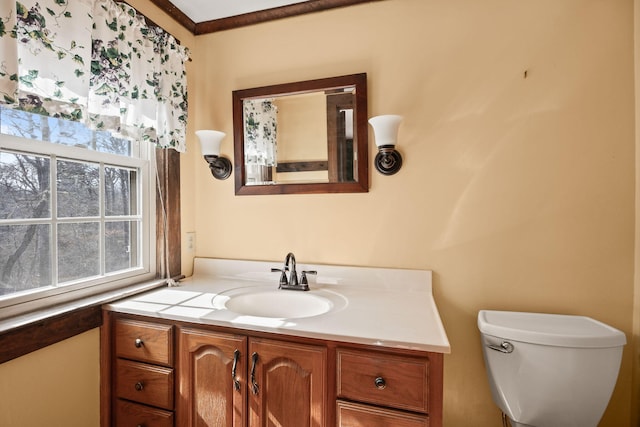 half bath with vanity and toilet