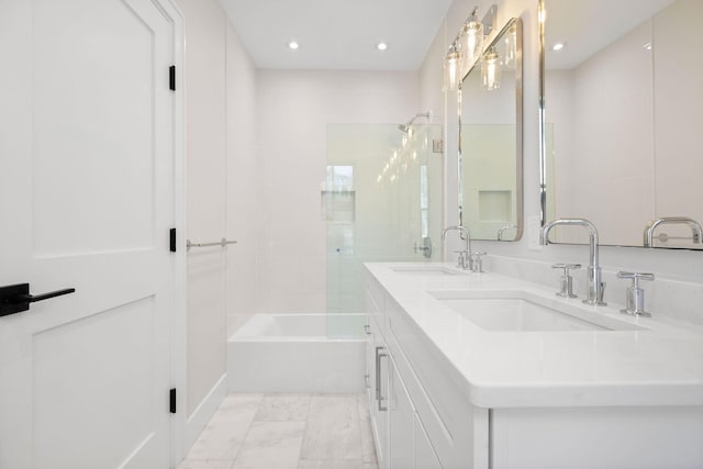 full bathroom with double vanity, a sink, bathing tub / shower combination, and recessed lighting