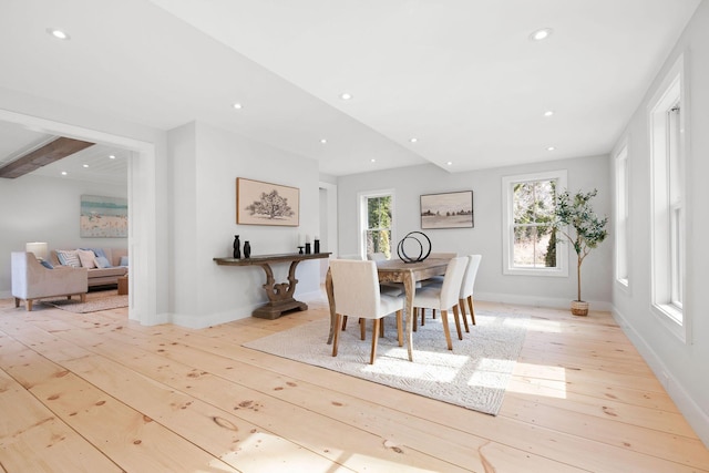 dining room featuring recessed lighting, wood-type flooring, and baseboards