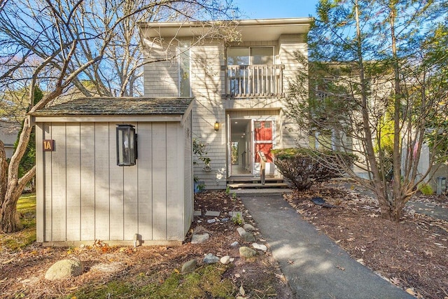 view of front of property with a balcony