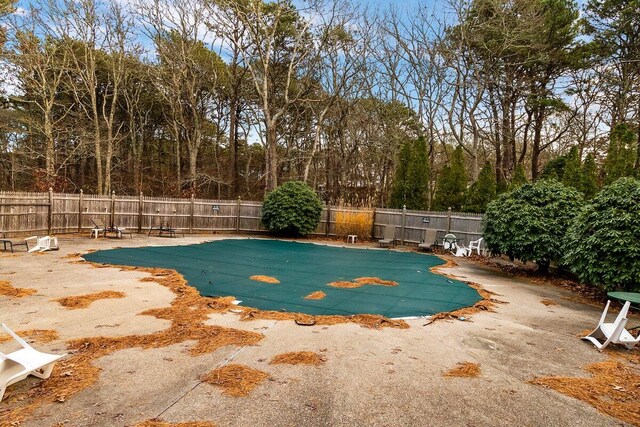 view of swimming pool featuring a patio