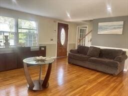 2 Spinning Brook Rd, South Yarmouth, MA 02664 - living room with wood finished floors and stairs