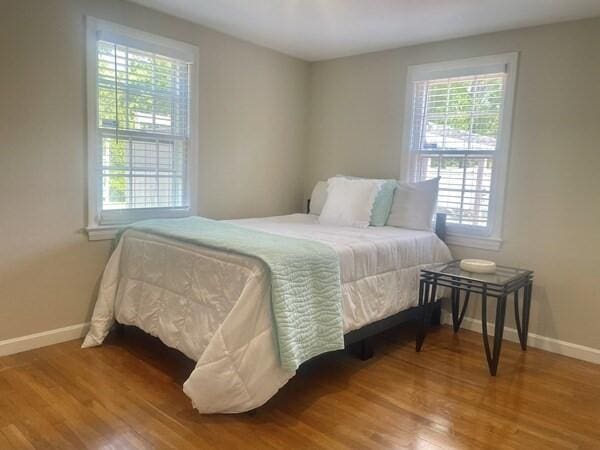 2 Spinning Brook Rd, South Yarmouth, MA 02664 - bedroom featuring baseboards and wood finished floors