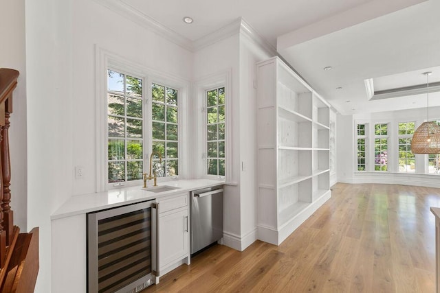 bar featuring white cabinets, dishwasher, wine cooler, sink, and built in features