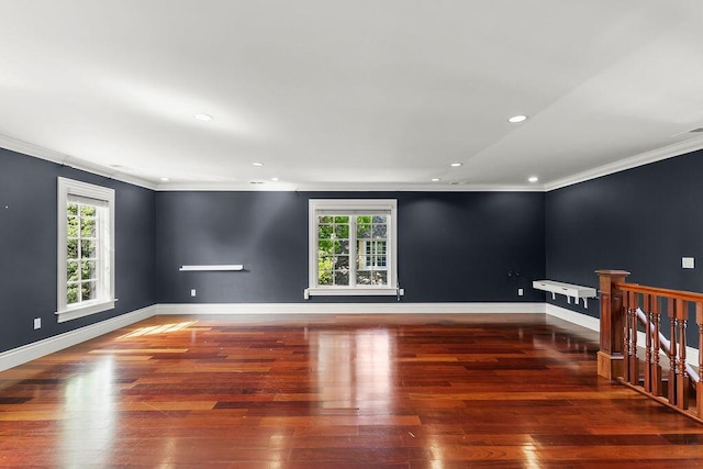 unfurnished room featuring crown molding and dark hardwood / wood-style flooring