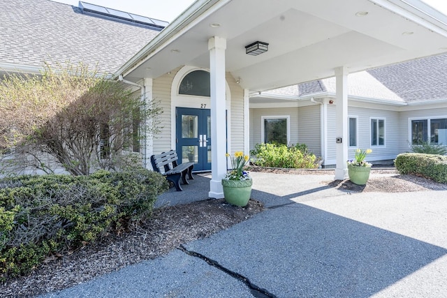 12 Kettle Ln, Mashpee, MA 02649 - property entrance featuring roof with shingles