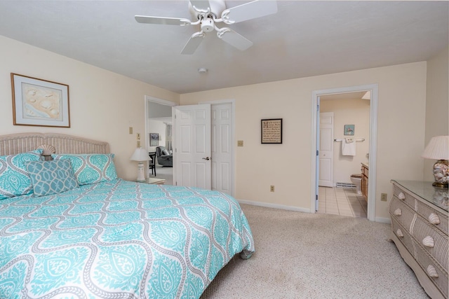 12 Kettle Ln, Mashpee, MA 02649 - carpeted bedroom with baseboards, ensuite bath, and a ceiling fan