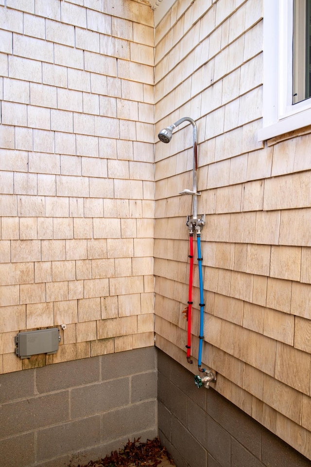 56 S Yarmouth Rd, Dennis, MA 02638 - bathroom featuring concrete block wall