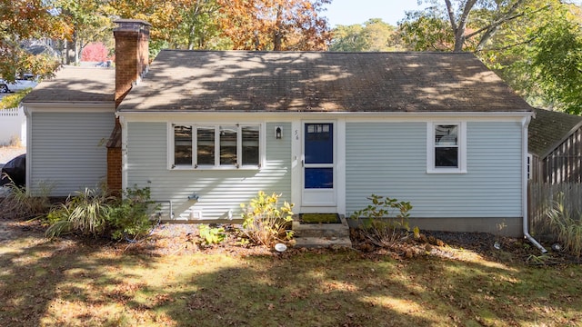 56 S Yarmouth Rd, Dennis, MA 02638 - view of front of house with a chimney and roof with shingles