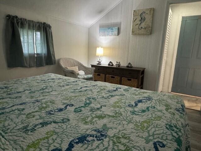 9 Bayberry Ln, South Dennis, MA 02660 - bedroom featuring lofted ceiling and wood finished floors