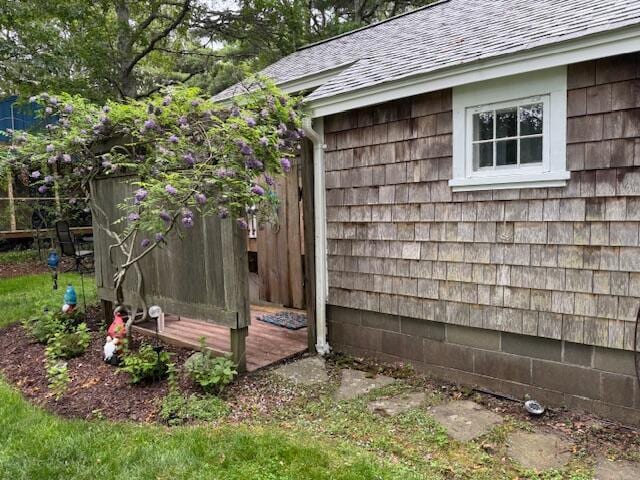 9 Bayberry Ln, South Dennis, MA 02660 - view of side of home with roof with shingles
