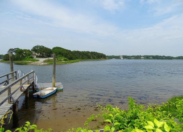 view of dock with a water view