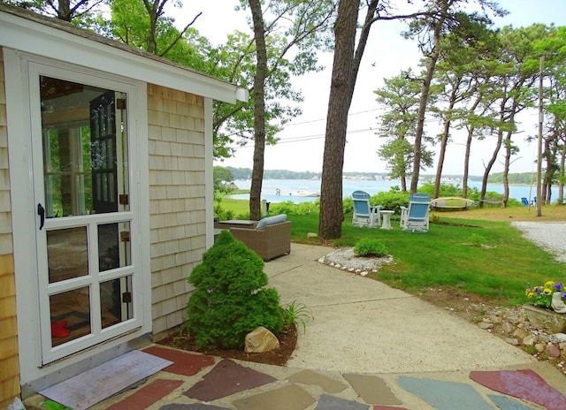 view of patio / terrace with a water view