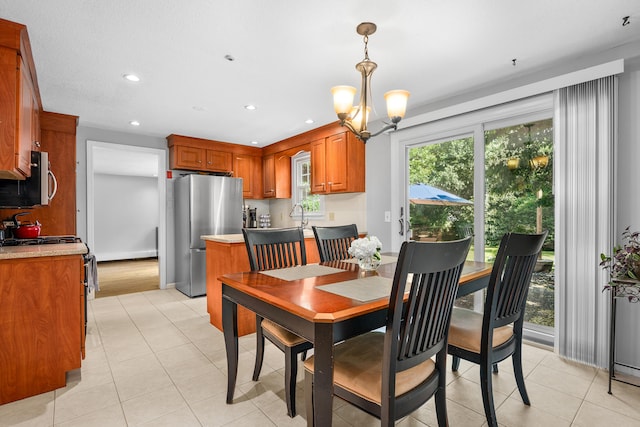 65 Hadrada Ln, Centerville, MA 02632 - dining area with a chandelier, recessed lighting, and light tile patterned floors