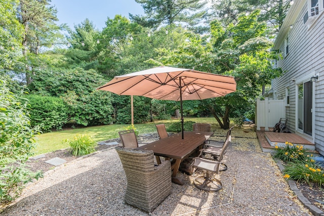 65 Hadrada Ln, Centerville, MA 02632 - view of patio featuring a deck and outdoor dining area