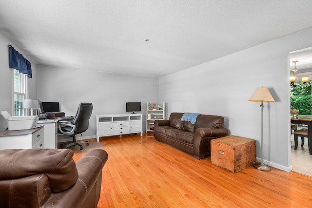 65 Hadrada Ln, Centerville, MA 02632 - office space featuring light wood-type flooring, plenty of natural light, and a chandelier