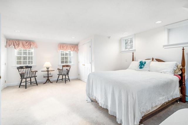 carpeted bedroom featuring a closet